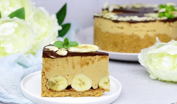 Mousse cottage cheese cake with condensed milk, bananas and chocolate icing
