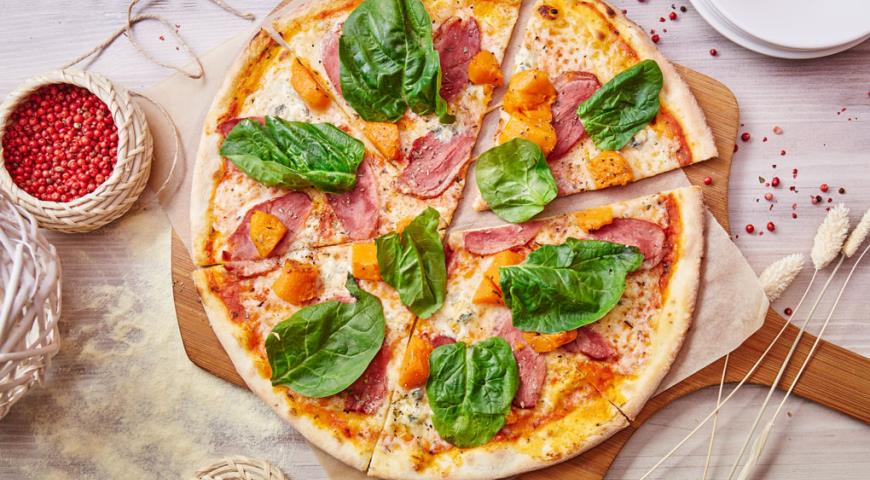 Pizza with duck, pumpkin and gorgonzola cheese