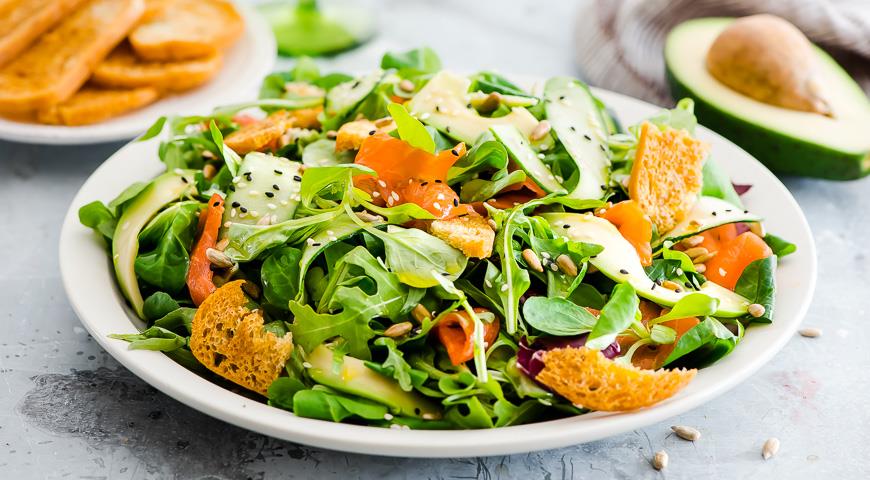 Festive summer salad with salmon and avocado