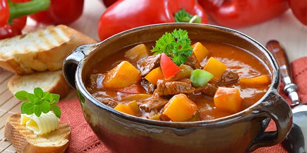 Classic goulash with sour cream and vegetables