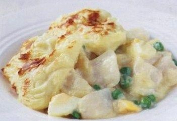 Fish with potatoes and green peas
