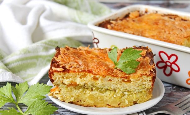 Potato casserole with zucchini, cottage cheese and cheese