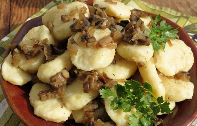 Lazy potato dumplings with mushroom and onion fried
