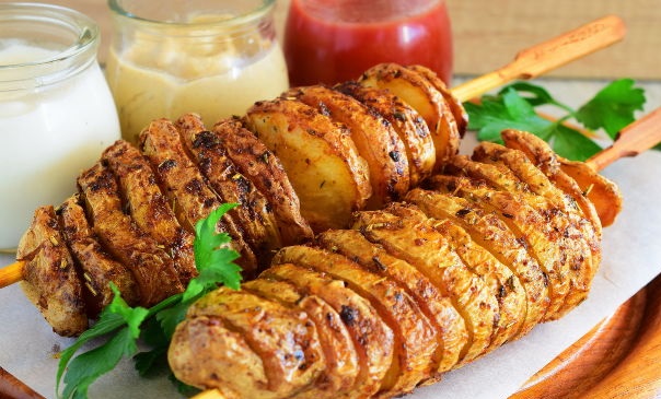 Spiral baked potatoes on a skewer