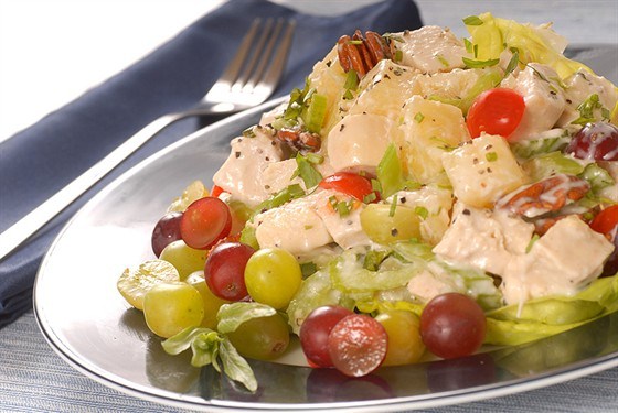 Chicken salad with grapes, nuts and capers
