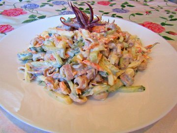 Diet salad with squid, eggs and vegetables