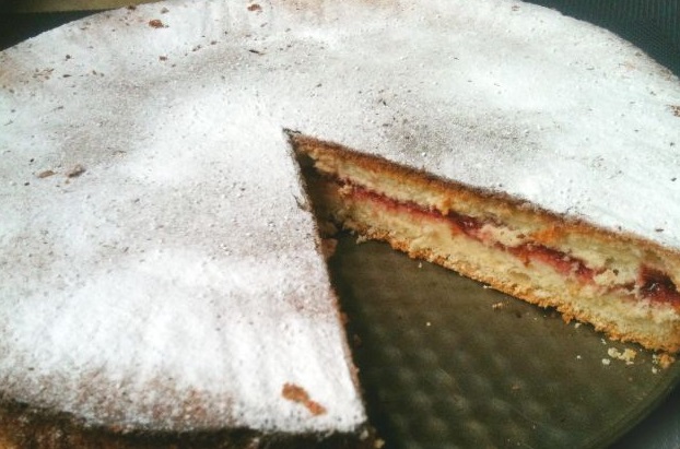 Simple biscuit cake with strawberry jam