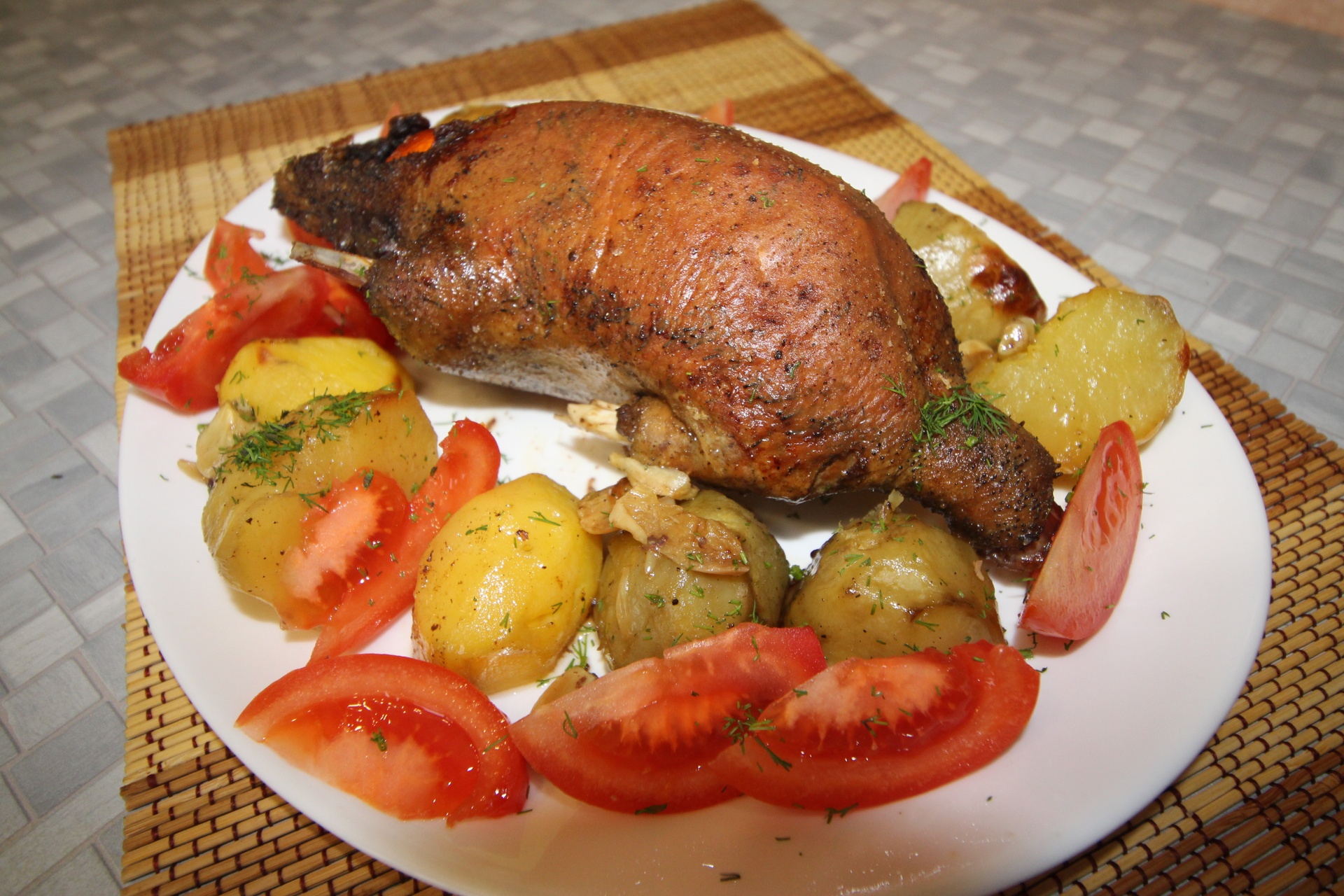 Roasted wild duck with potatoes