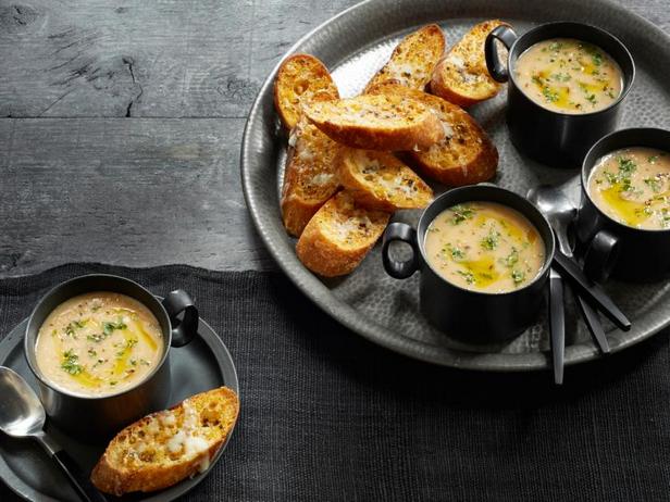 Baked garlic and crostini soup with Asiago cheese