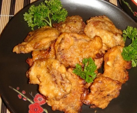 Pork in batter with cheese sauce