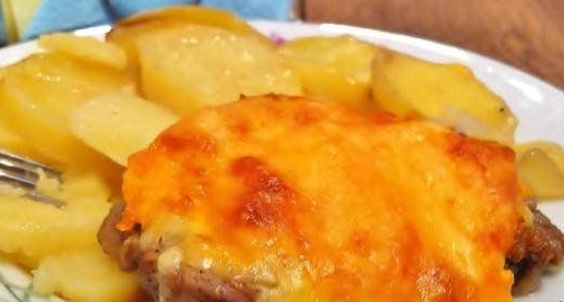 Pork baked with potatoes