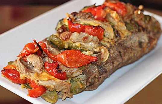 Super-tender pork baked with cheese and vegetables