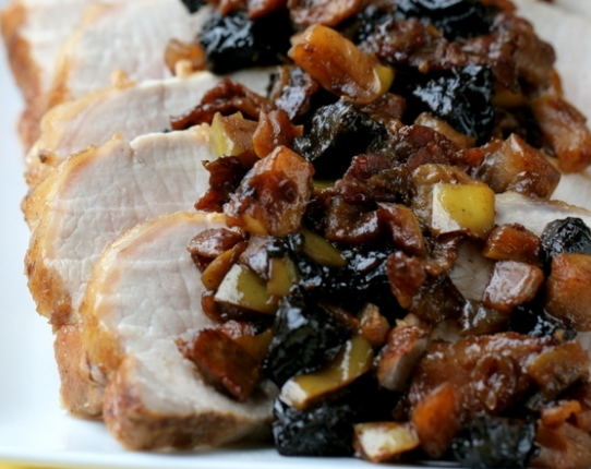 Pork in the oven with prunes, apples and garlic
