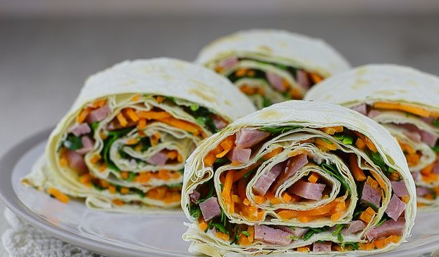 Lavash roll with ham, Korean-style carrots and herbs