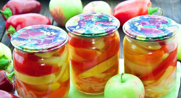 Pickled sweet peppers with apples, onions and ketchup