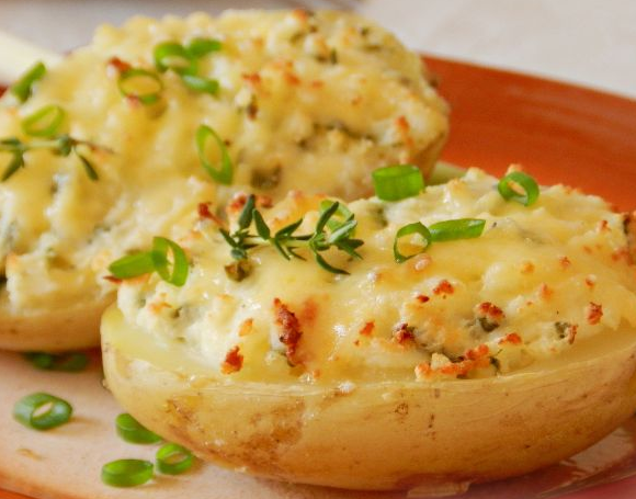 Tasty Baked potatoes stuffed with feta cheese