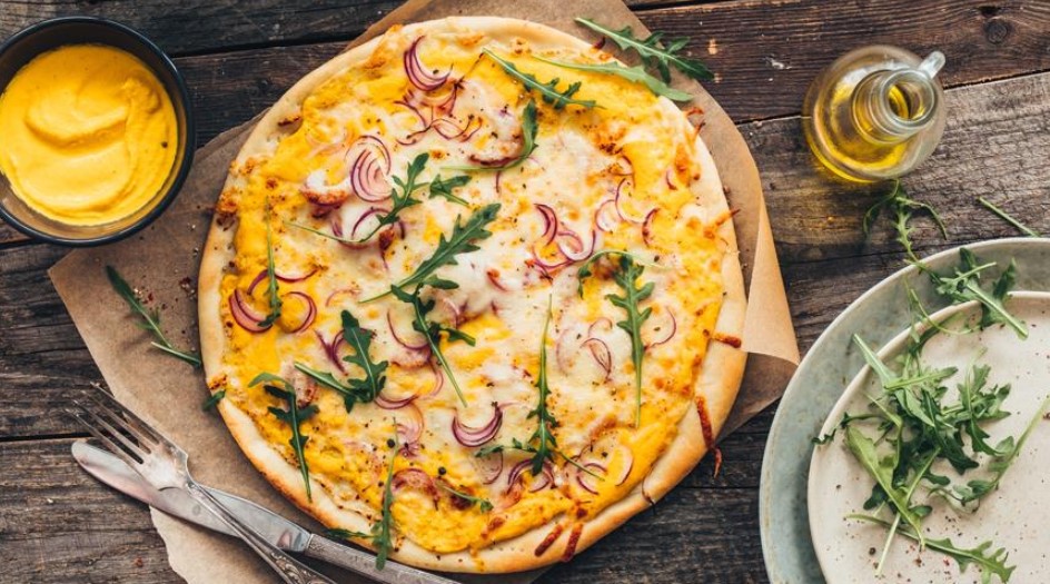 Spicy pizza with carrot puree and suluguni