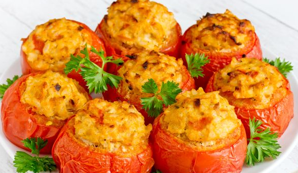 Baked tomatoes stuffed with chicken and rice