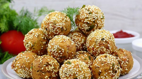 Cottage cheese croquettes with herbs and sesame seeds