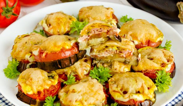 Eggplant baked with tomatoes, sausage and cheese