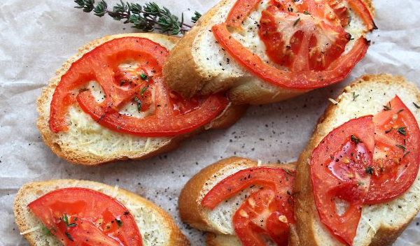 Hot sandwiches with cheese and tomatoes