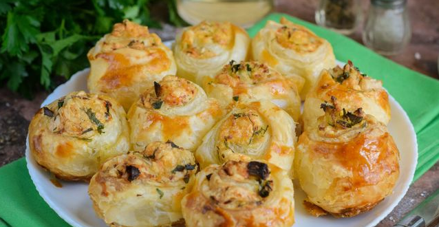 Layered snail rolls with egg, cheese and herbs