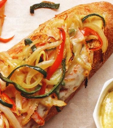 Hot baguette with vegetables and cheese