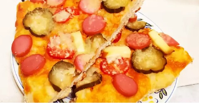 Pizza with pickles and parmesan