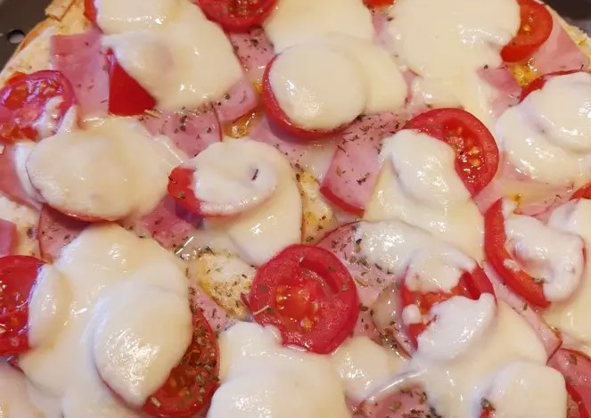 Tortilla pizza with ham and mozzarella