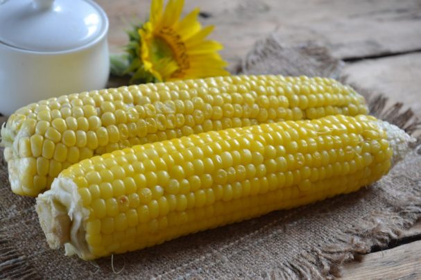 Corn baked in foil on the grill