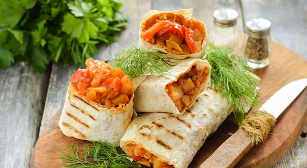 Tasty Lavash roll with potatoes, zucchini, cabbage and pepper