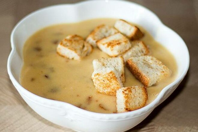 Mushroom soup with potatoes and carrots