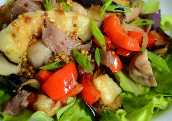 Warm salad with eggplant and beef tongue