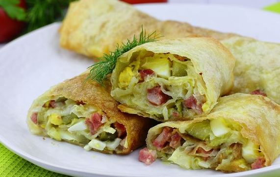 Lavash roll with sausage, boiled eggs, cabbage and pickles (in the oven)
