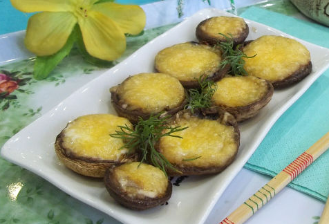 Champignons stuffed with nuts and cheese