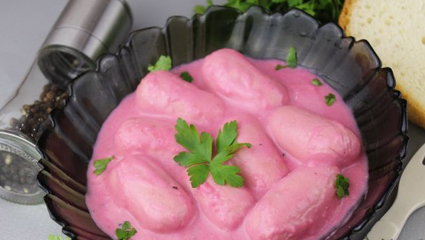 Sausages with sour cream sauce