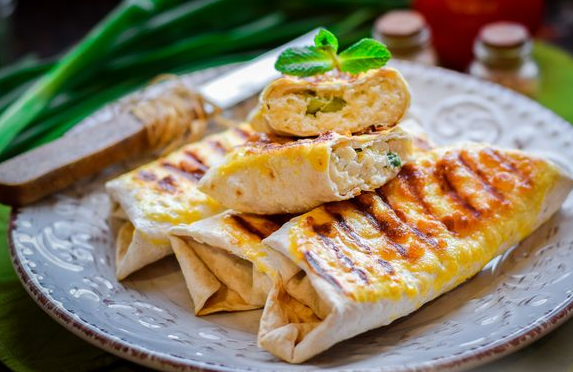 Lavash rolls with cottage cheese and cheese filling