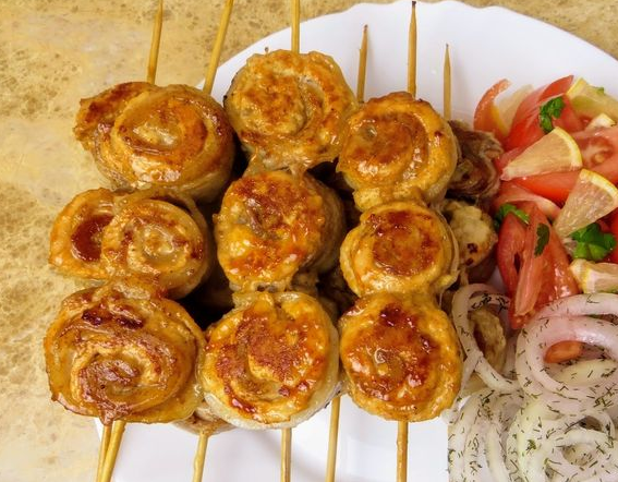 Chicken and bacon skewers (in a frying pan)