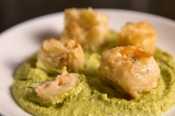 Potato croquettes with salmon and green pea cream