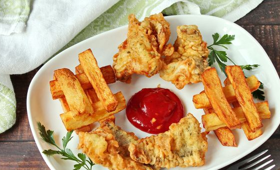 Fried fish in beer batter with french fries