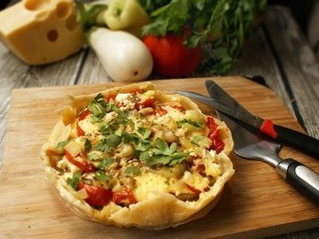 Vegetable pie on puff pastry in a slow cooker