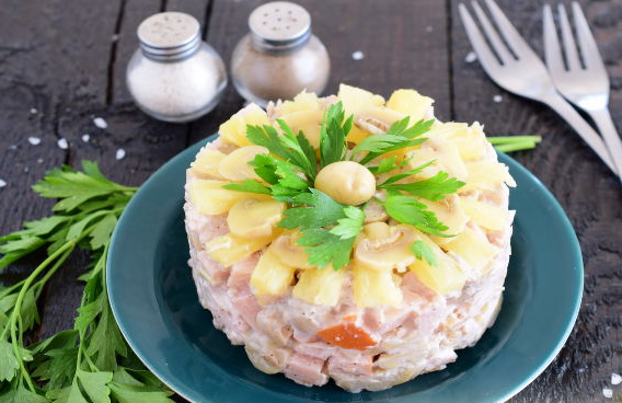 Meat salad with pineapple and mushrooms