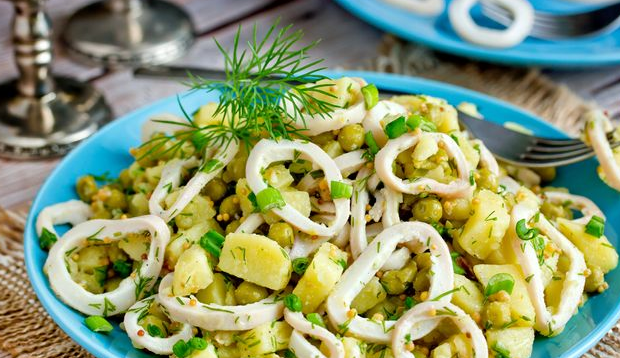 Salad with squid, potatoes and green peas