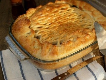 Yeast pie with potatoes and mushrooms
