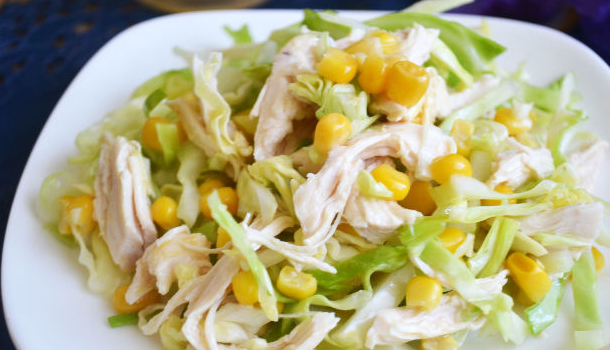 Salad of young cabbage, corn and chicken fillet