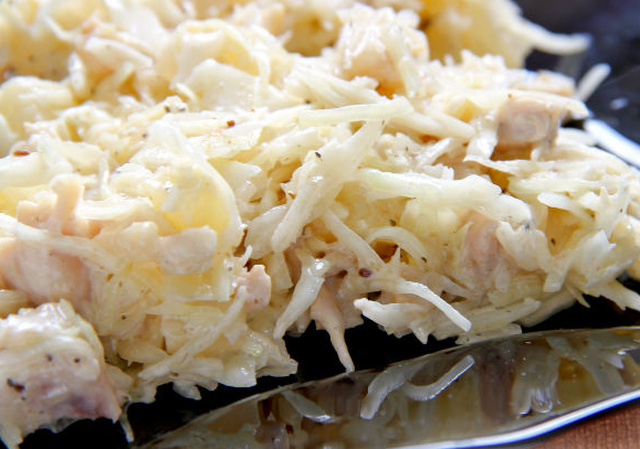 Salad with chicken, pineapple, cabbage and celery