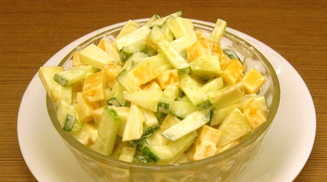 Cheese salad with apples and cucumbers