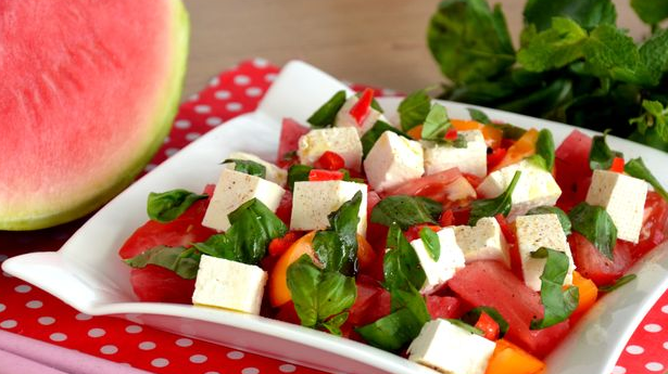 Salad with watermelon, tomatoes and cheese