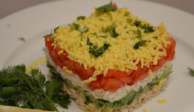 Layered salad with chicken breast