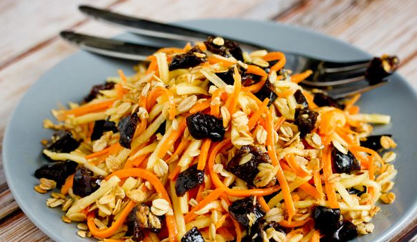 Carrot and apple salad with oatmeal and prunes